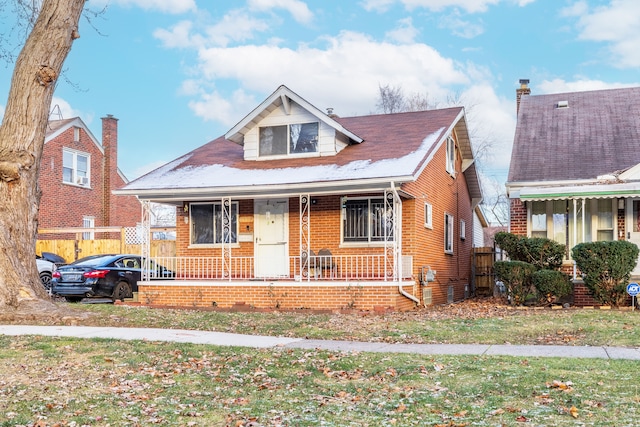 bungalow featuring covered porch