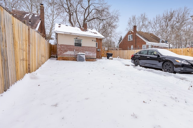 view of yard covered in snow