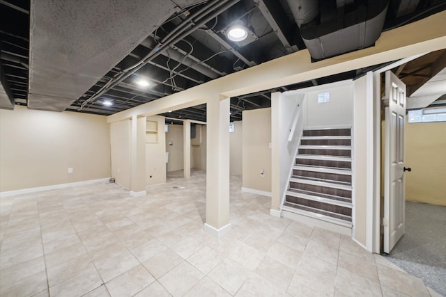 basement featuring tile patterned floors