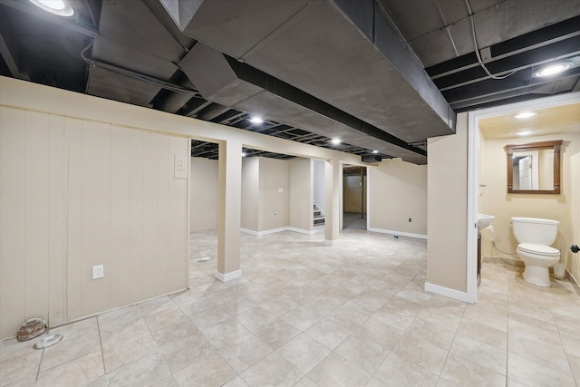 basement with light tile patterned floors