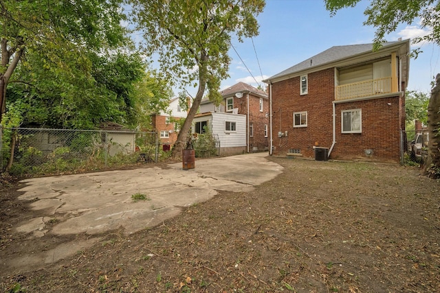 back of house featuring a patio and central AC