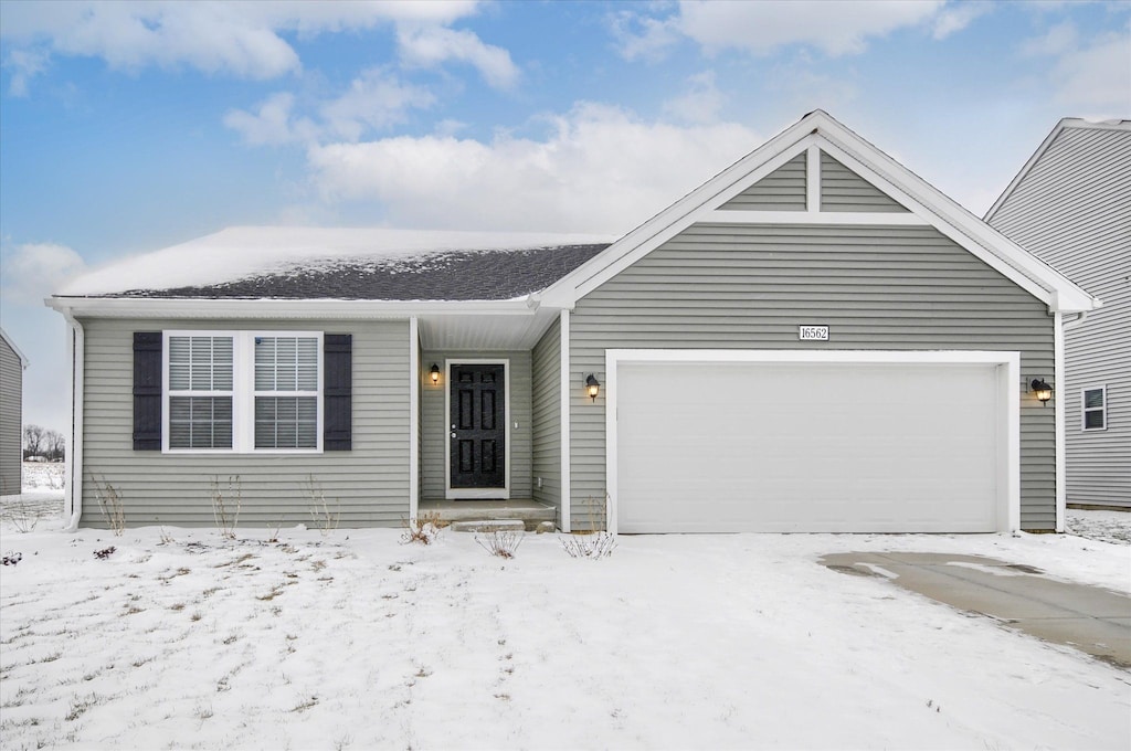 single story home with a garage