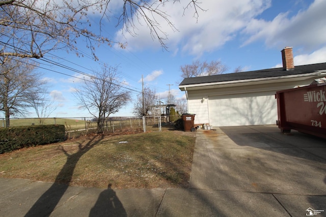 view of yard featuring a garage