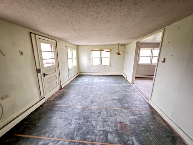 interior space featuring baseboard heating