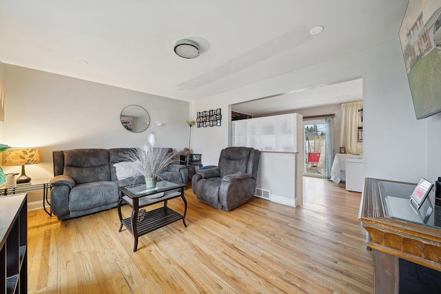 living room with light wood-type flooring