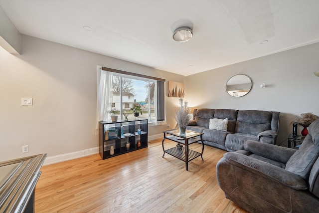 living room with light hardwood / wood-style floors