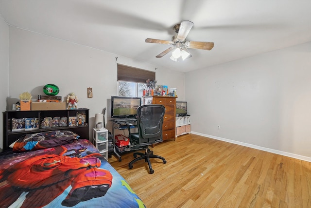 bedroom with light wood-type flooring and ceiling fan