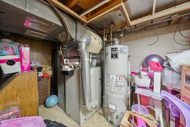 utility room featuring gas water heater