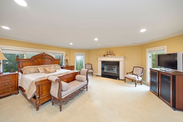 carpeted bedroom with ornamental molding