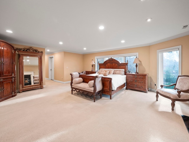 bedroom with multiple windows, light carpet, and ornamental molding