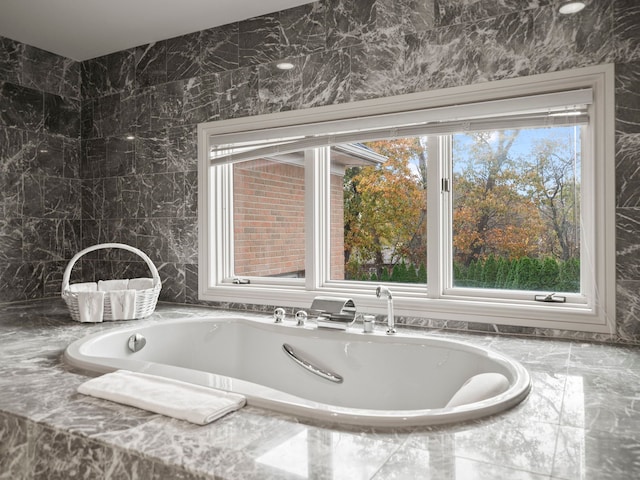 bathroom with tile walls