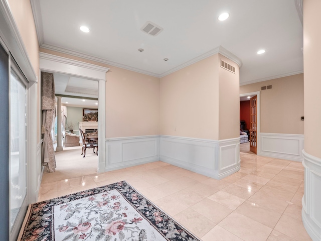 hallway with light carpet and ornamental molding