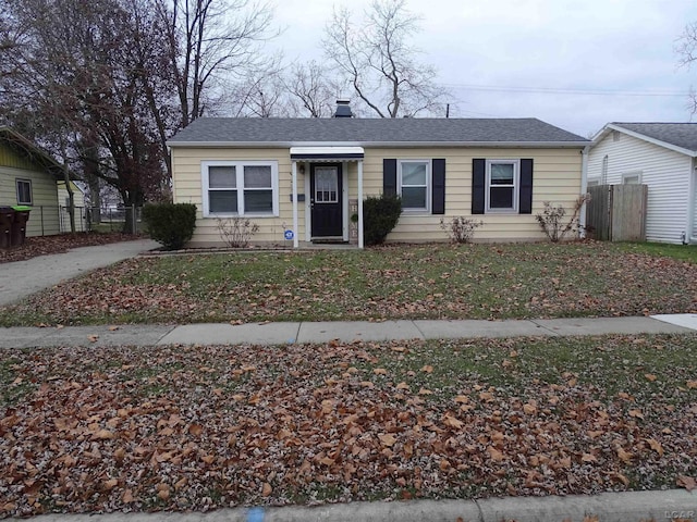 ranch-style house with a front yard