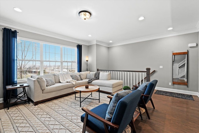 living room featuring wood-type flooring and ornamental molding