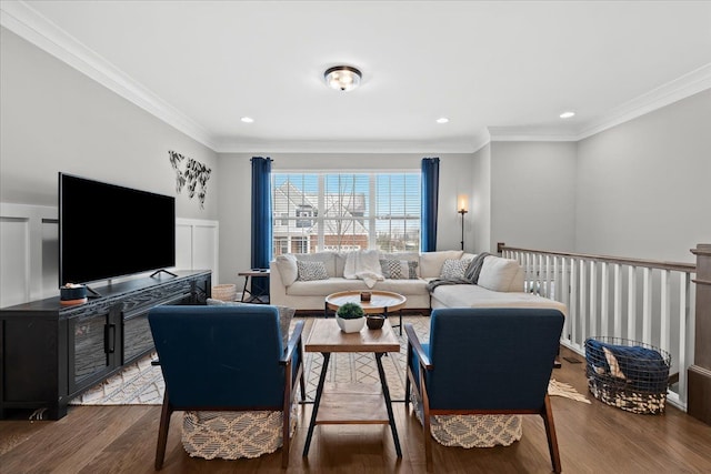 living room featuring ornamental molding and hardwood / wood-style flooring