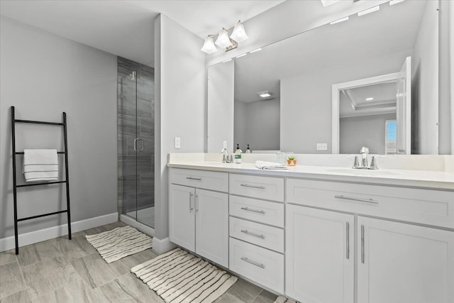 bathroom featuring walk in shower and vanity