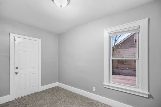 empty room featuring carpet floors