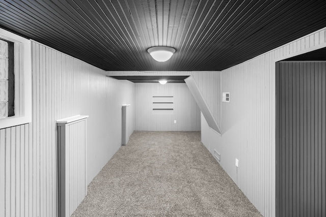 interior space featuring light colored carpet