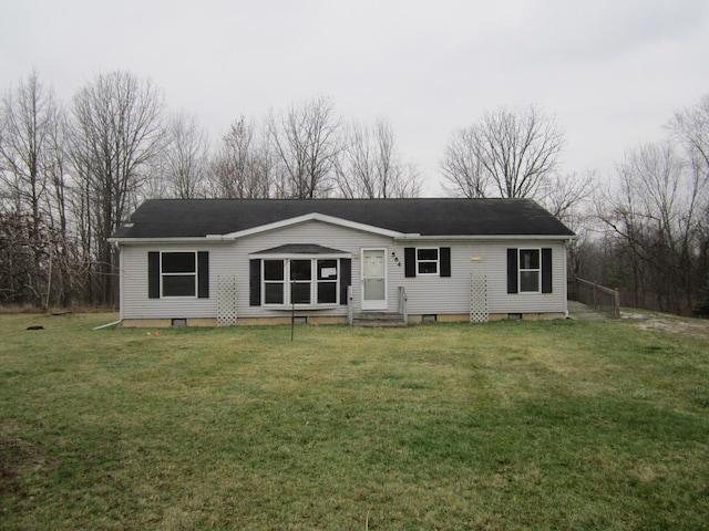 view of front facade with a front yard