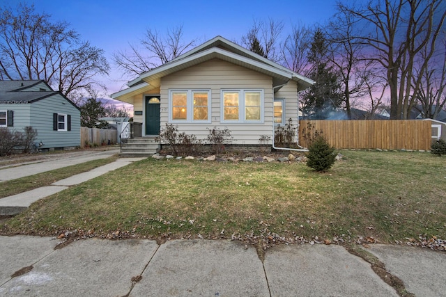 view of front of home featuring a yard