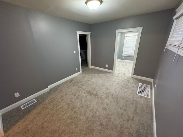 view of carpeted spare room