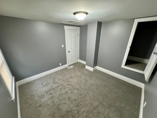 spare room with carpet flooring