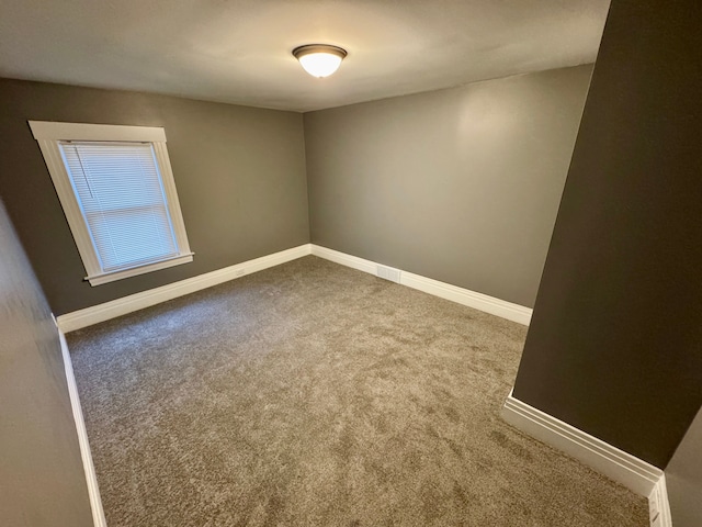 view of carpeted spare room