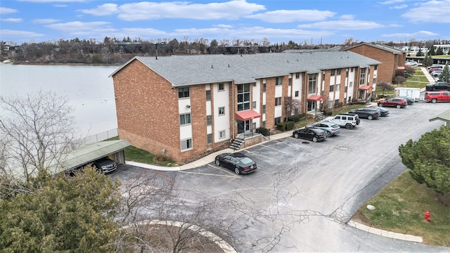 view of building exterior with a water view