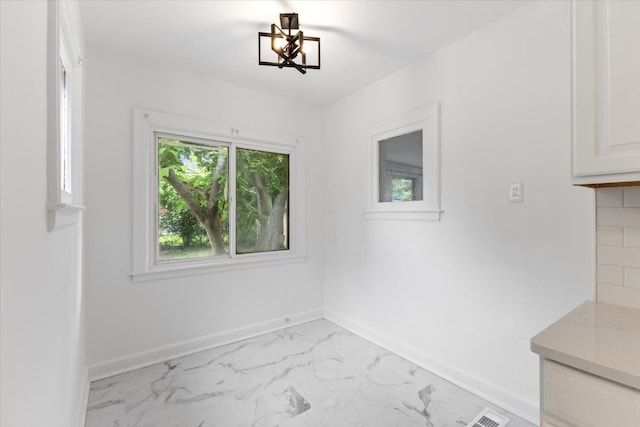 view of unfurnished dining area