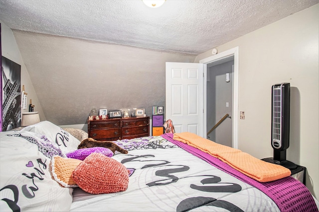 bedroom featuring a textured ceiling