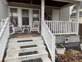 property entrance featuring a porch