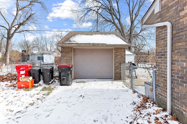 view of snow covered garage