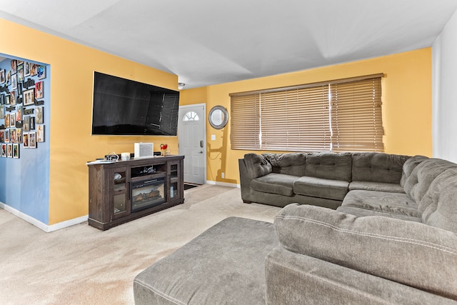 living room featuring light carpet