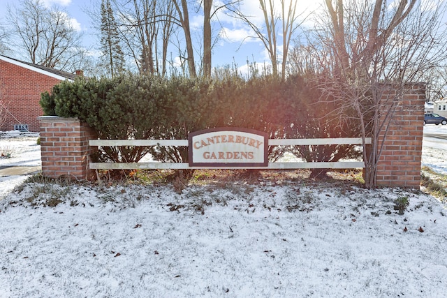 view of snow covered gate