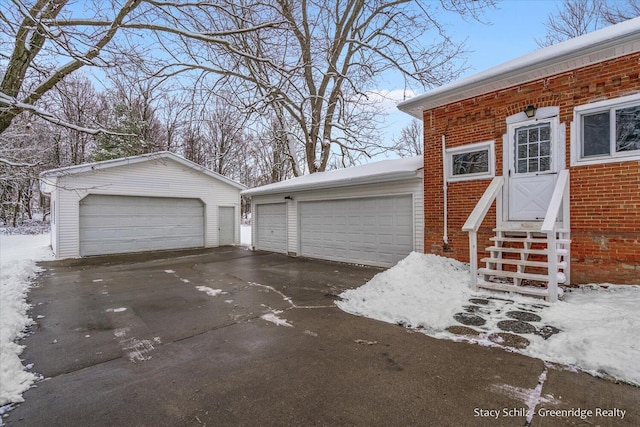 view of snow covered garage