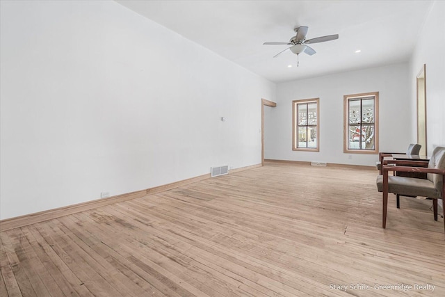 interior space featuring light hardwood / wood-style floors and ceiling fan