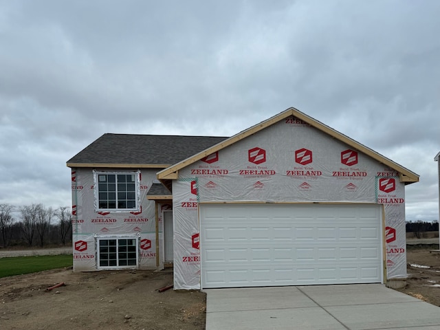 property in mid-construction featuring a garage