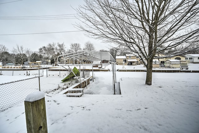 view of yard covered in snow