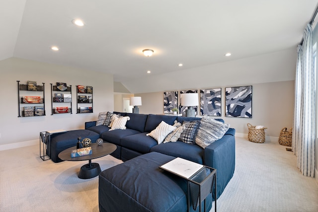 living room with light carpet and vaulted ceiling