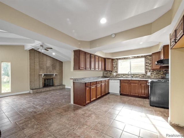 kitchen featuring dishwasher, a brick fireplace, vaulted ceiling, ceiling fan, and black range with electric cooktop