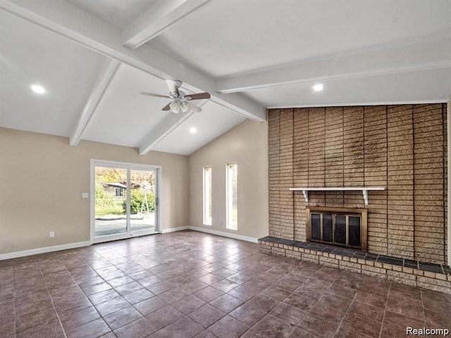 unfurnished living room with beam ceiling, ceiling fan, dark tile patterned floors, high vaulted ceiling, and a fireplace