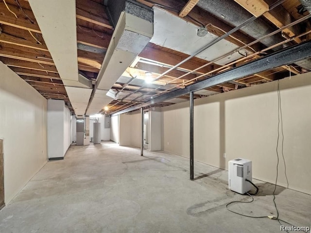 basement featuring gas water heater