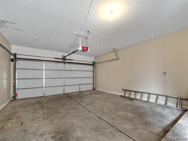 garage featuring a garage door opener