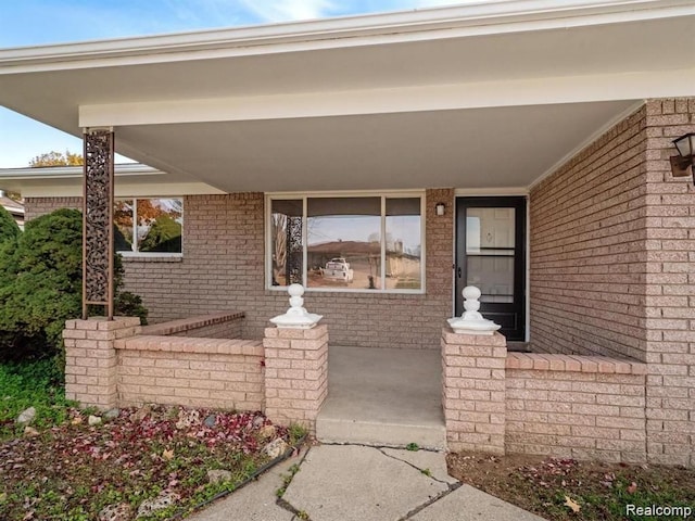 property entrance with a porch