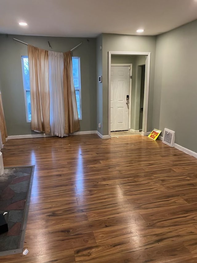 interior space with dark hardwood / wood-style floors