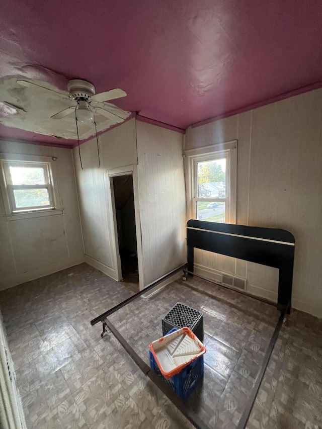 unfurnished bedroom with ceiling fan