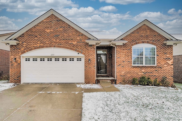 view of front of property featuring a garage