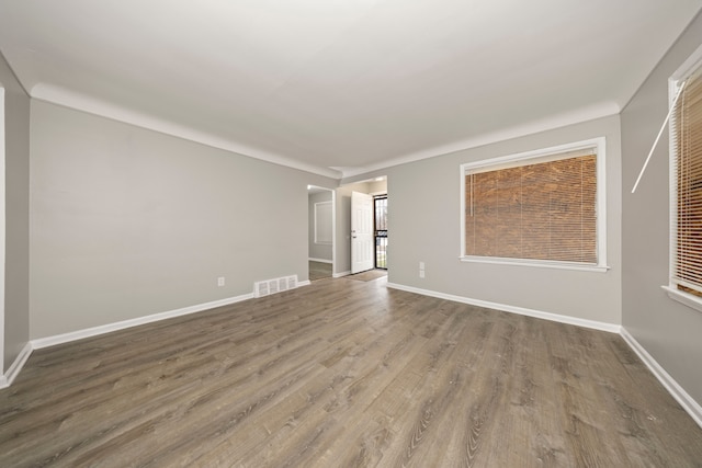 unfurnished room featuring hardwood / wood-style floors