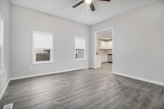 322 Emmons St, Niles, MI 49120 - spare room featuring a ceiling fan and wood finished floors