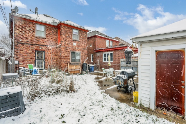 view of snow covered property